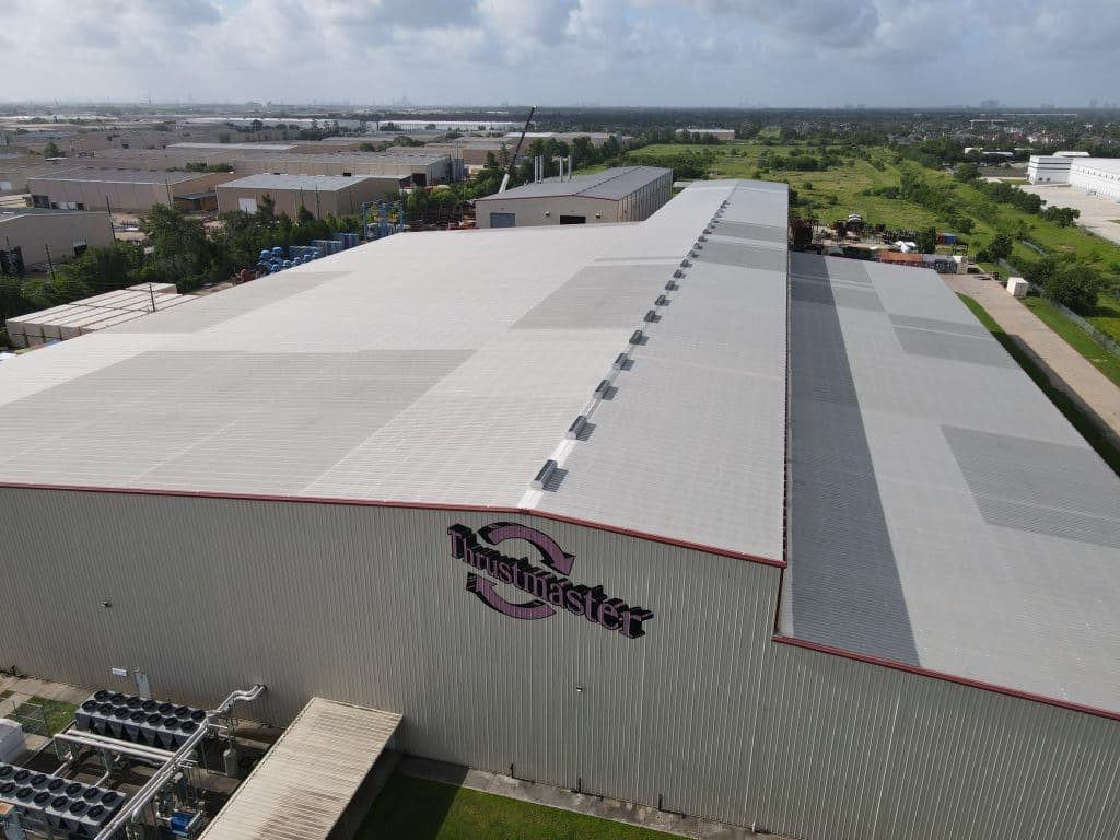 Home with trees and an orange sunset