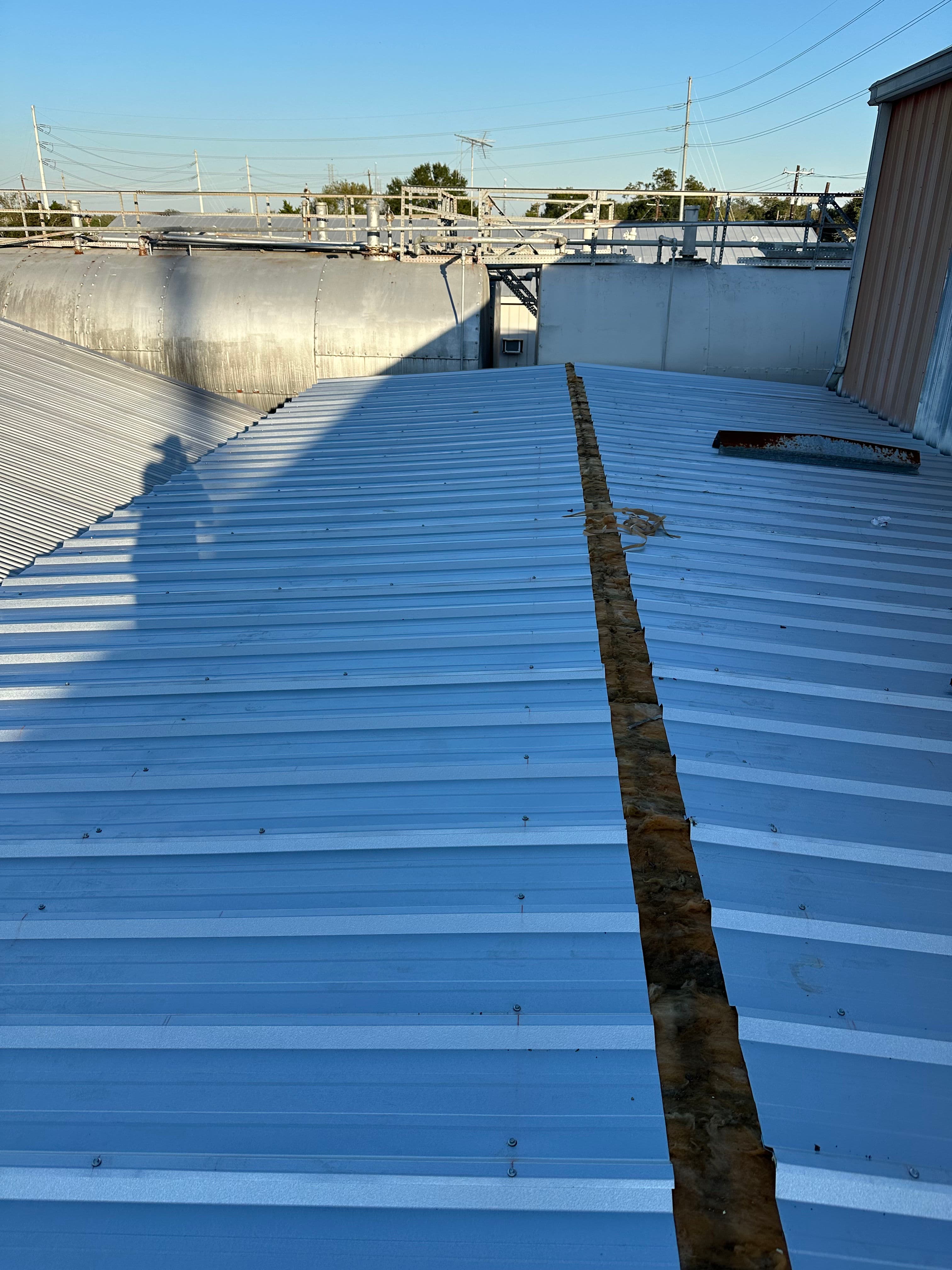 Project Metal Rooftop Secured at Fort Bend Hydraulics image