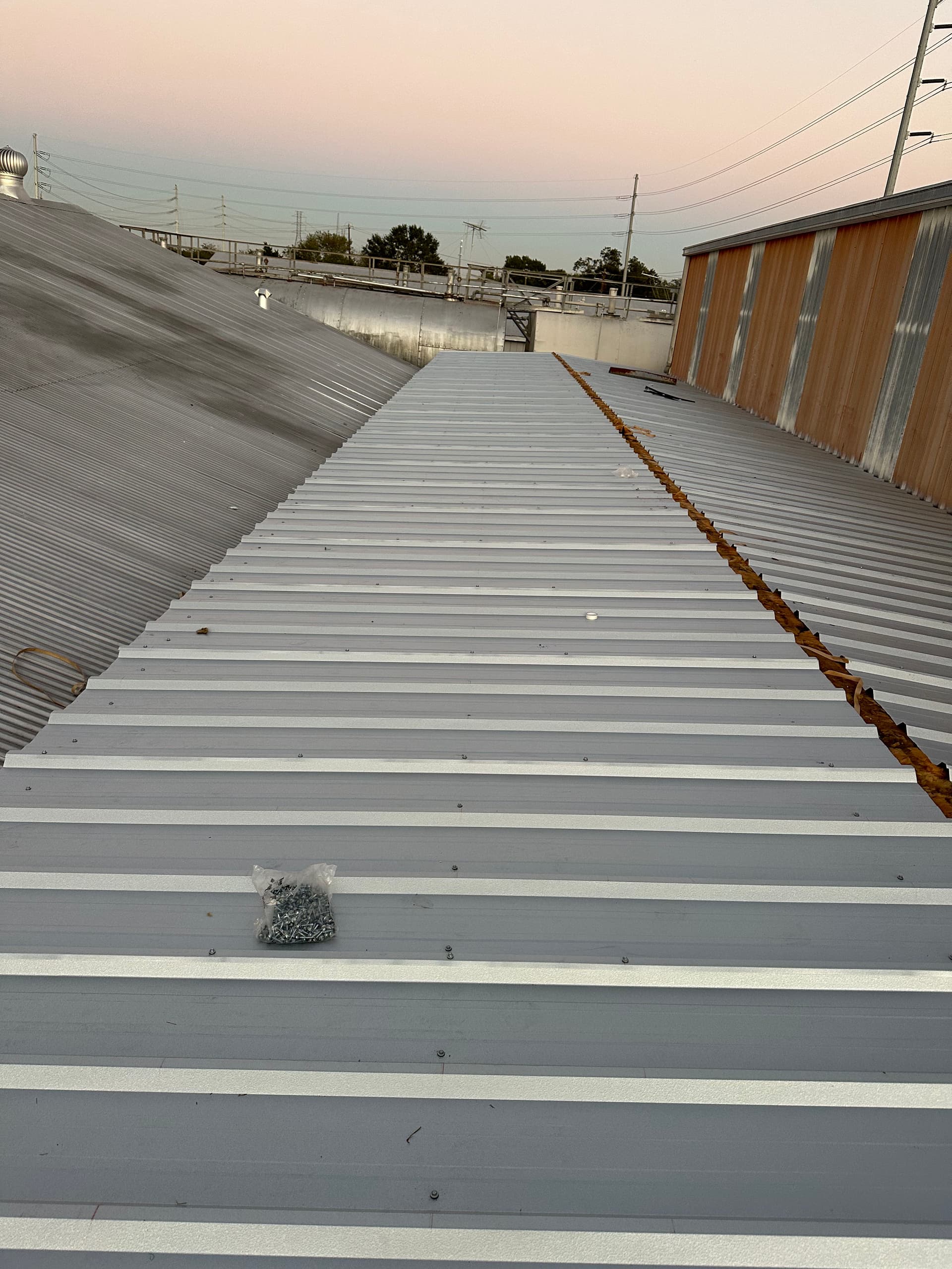 Gallery photos for Metal Rooftop Secured at Fort Bend Hydraulics: Image #3