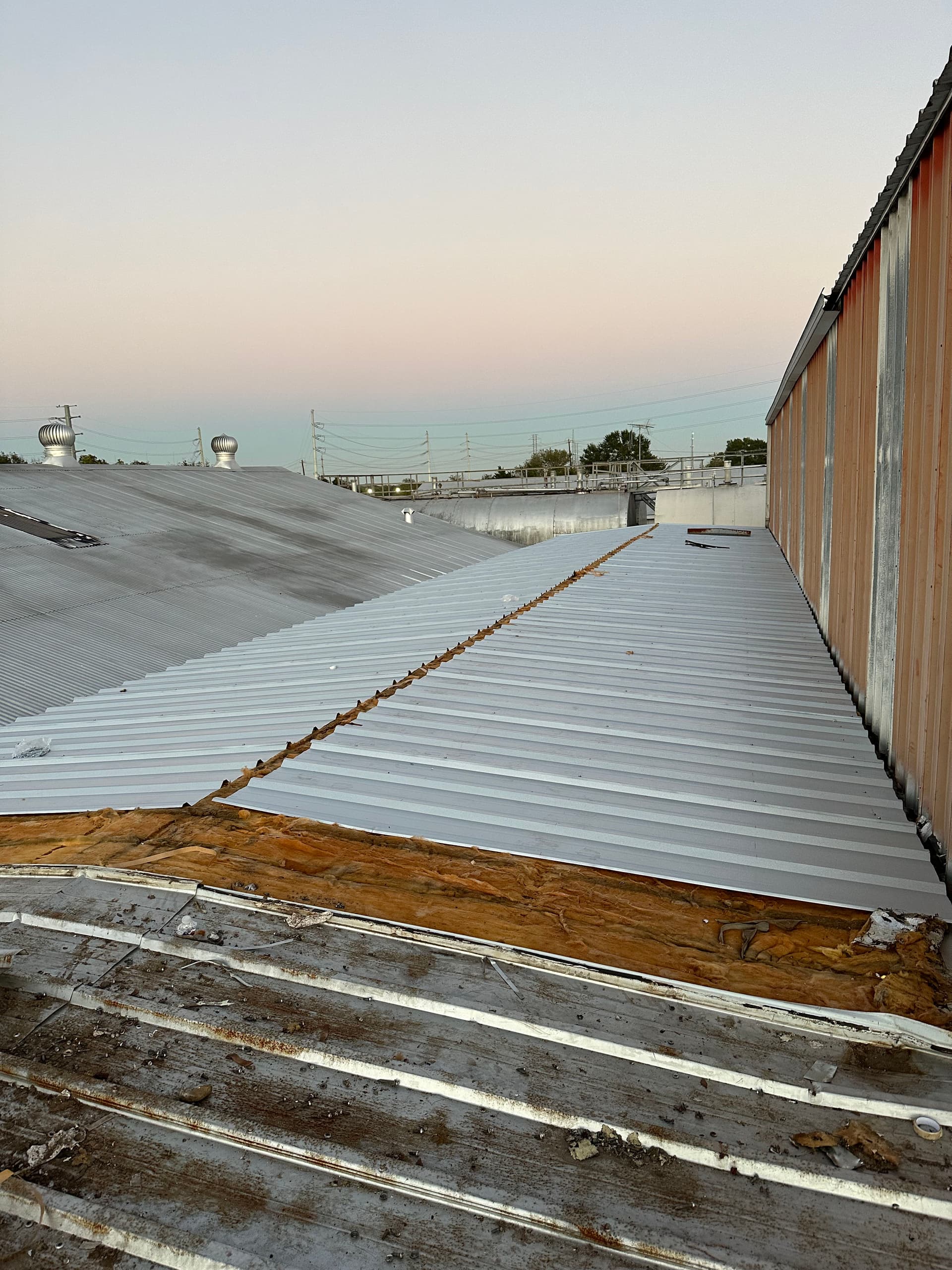 Gallery photos for Metal Rooftop Secured at Fort Bend Hydraulics: Image #2