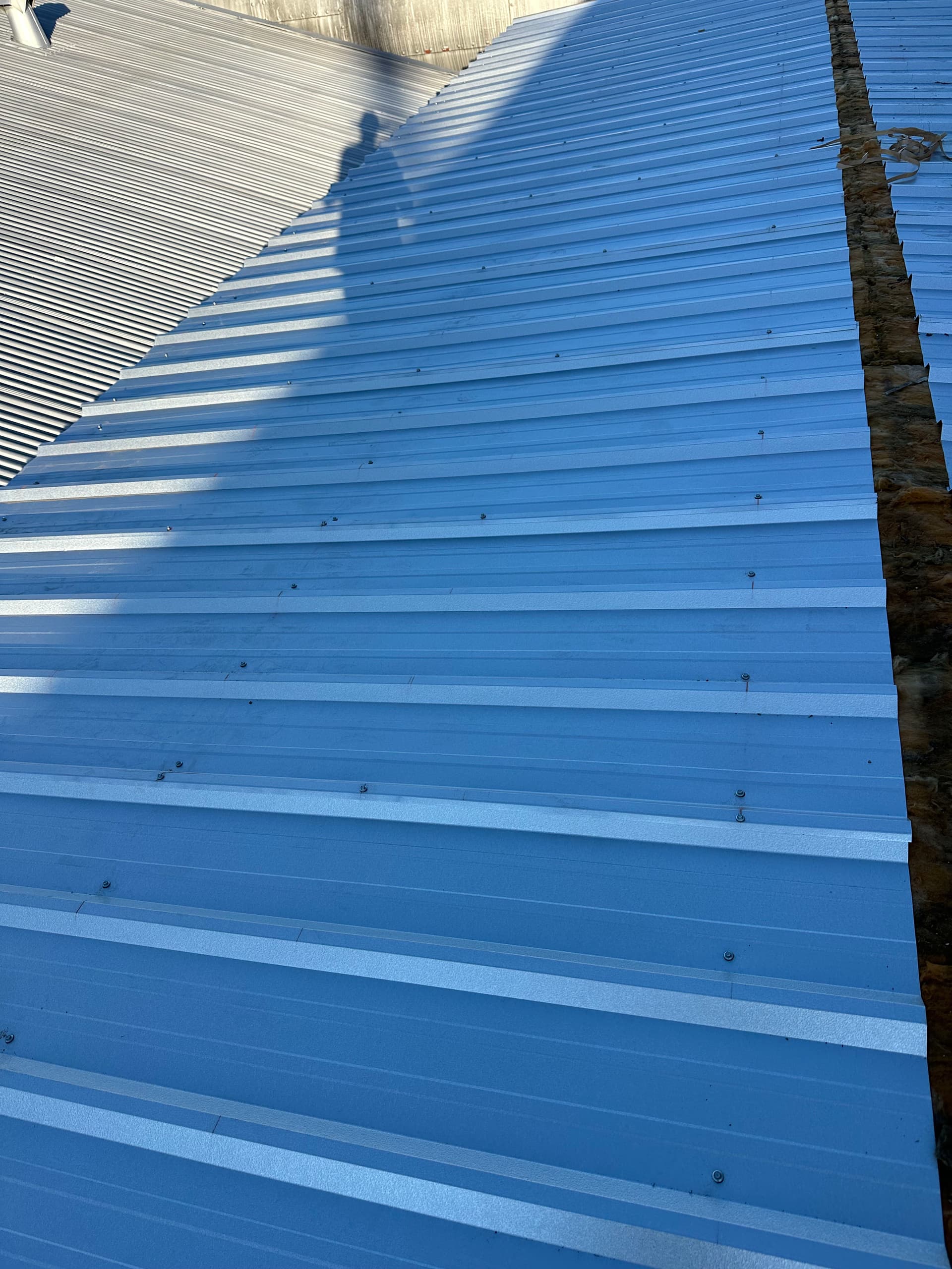 Gallery photos for Metal Rooftop Secured at Fort Bend Hydraulics: Image #1